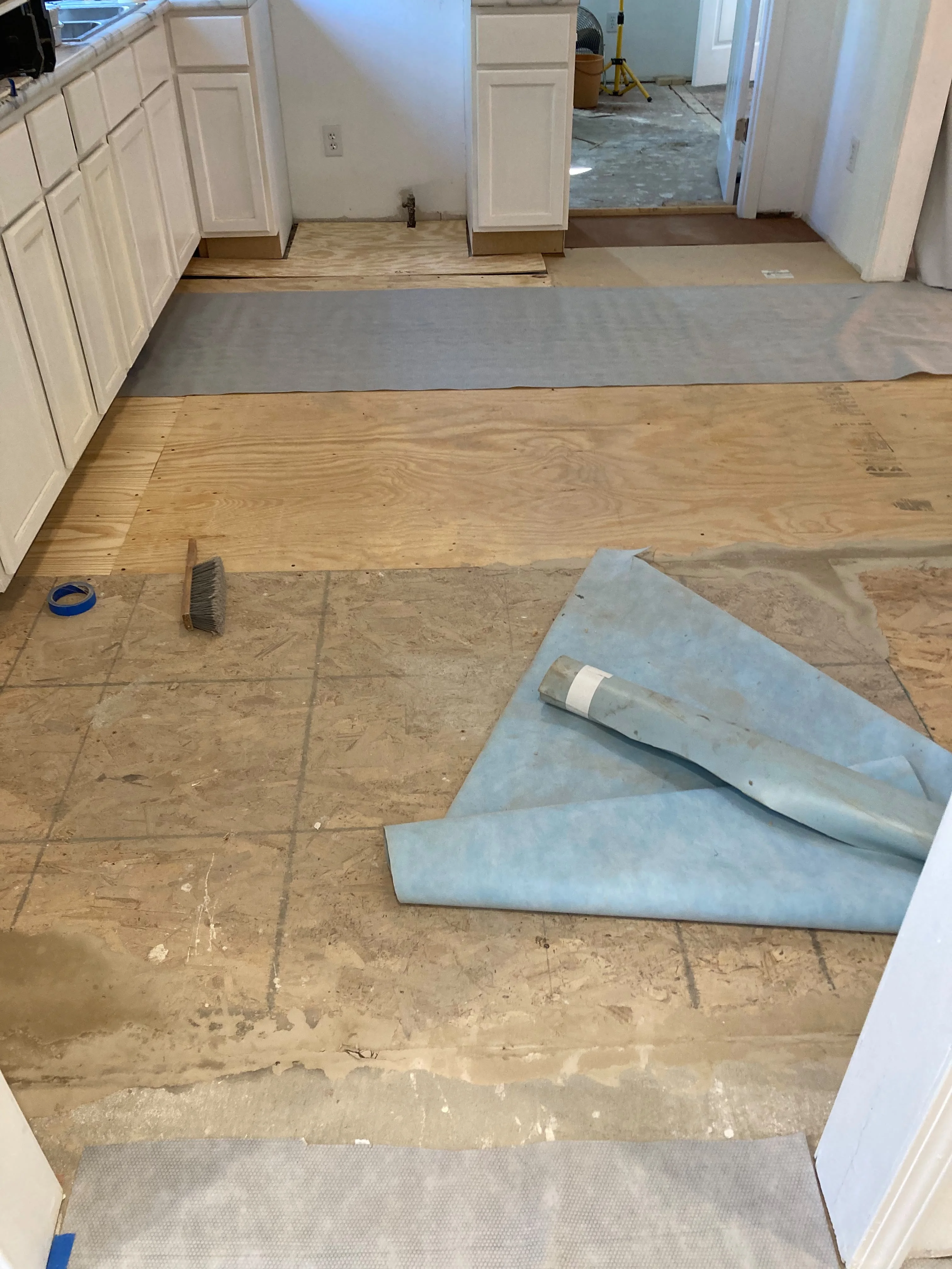 Kitchen subfloor preparation before new flooring installation
