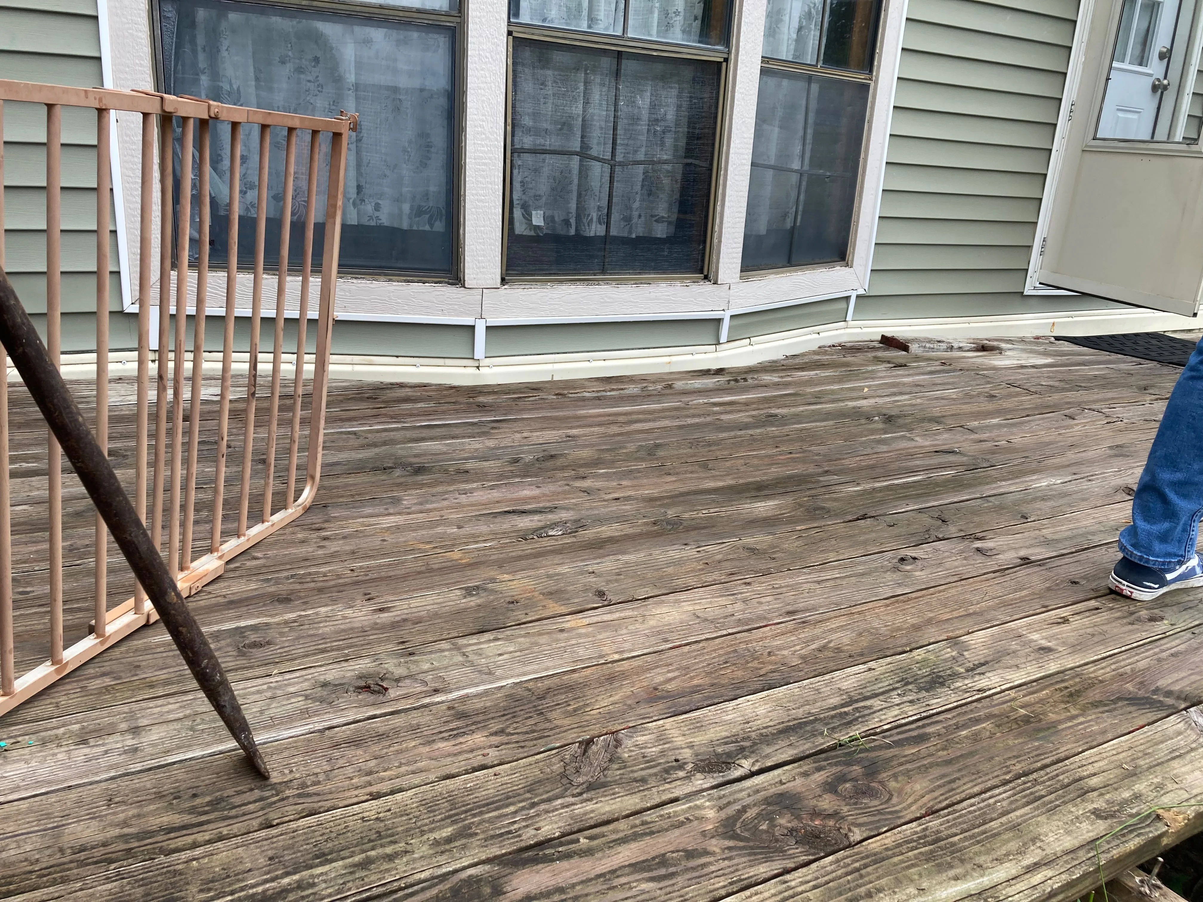 Deck and exterior siding project by Camacho's Construction