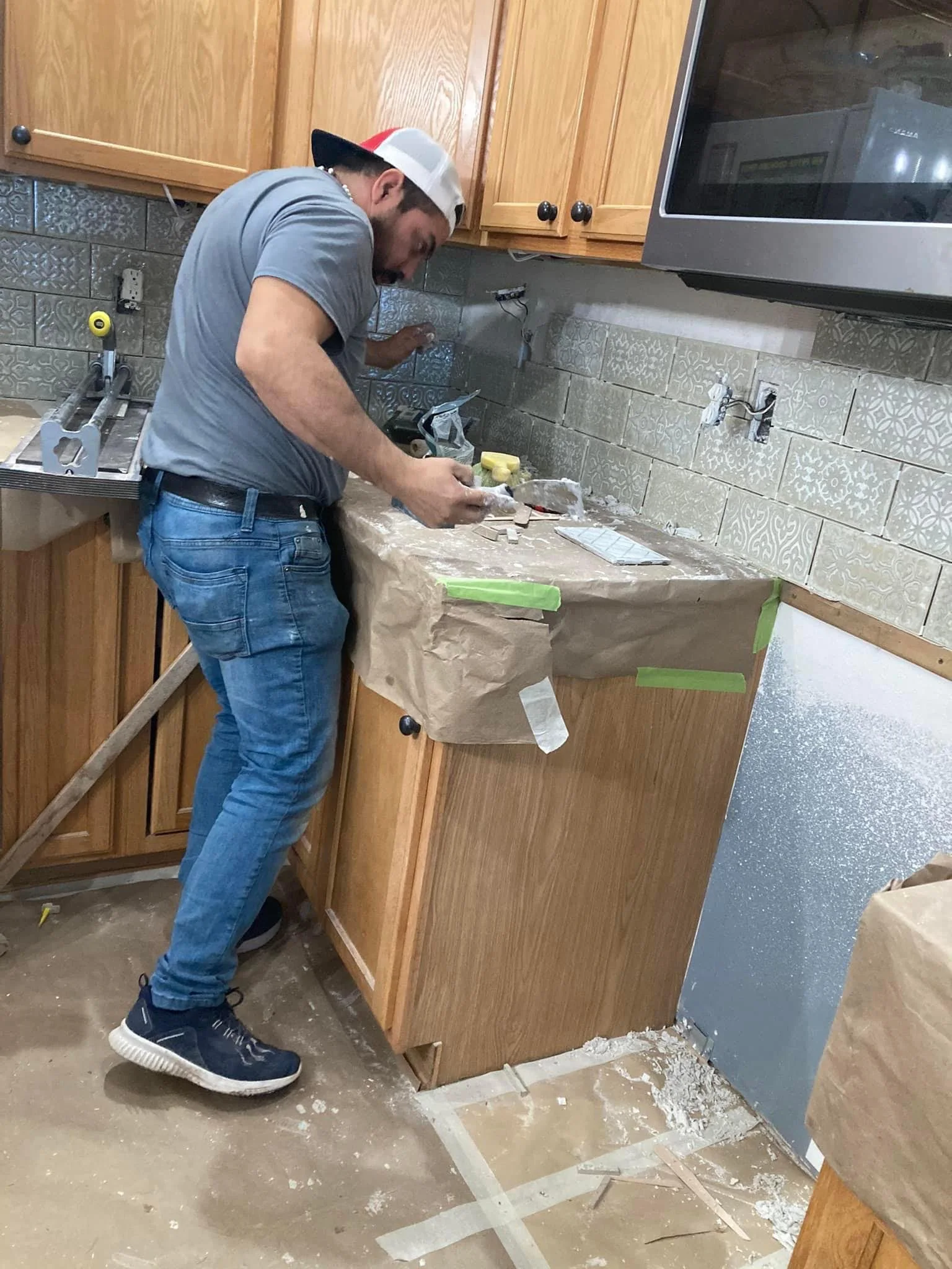 Kitchen backsplash tile installation by Camacho's Construction