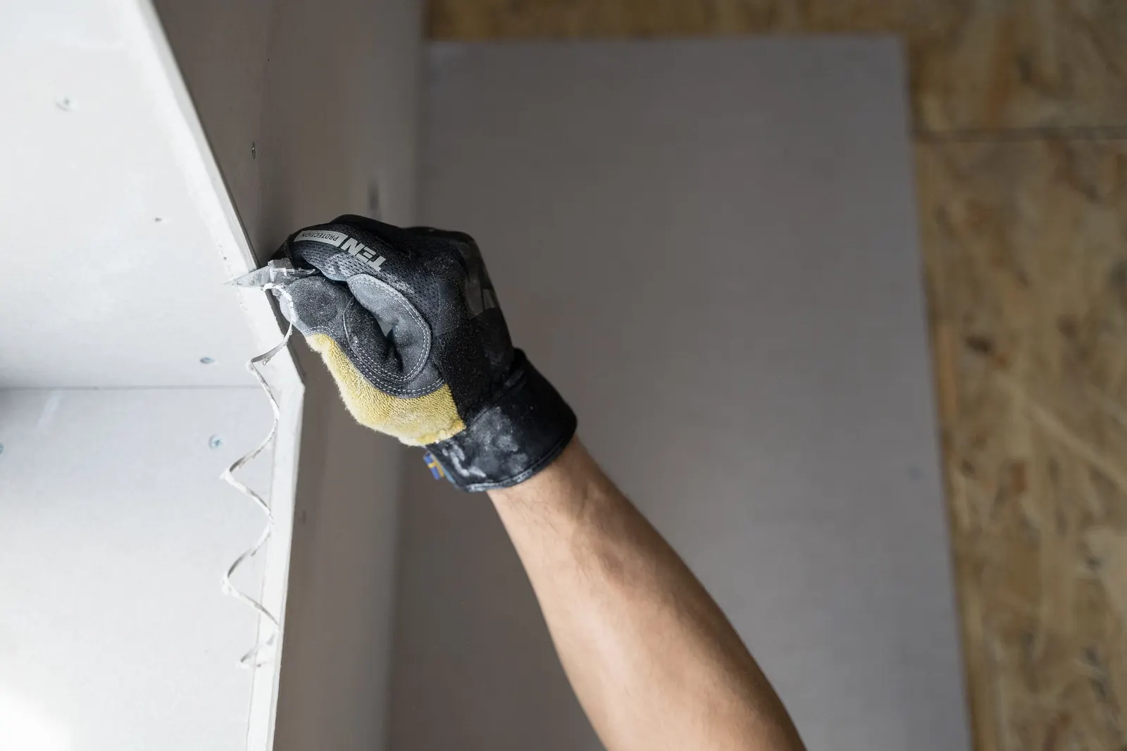 Drywall repair being done in a Des Moines home